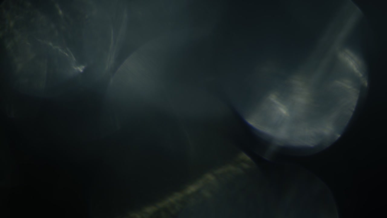 fugas de luz 4k imágenes. lente brillo llamarada bokeh superposiciones, quemar el fondo de la llama. efecto de rayos flash