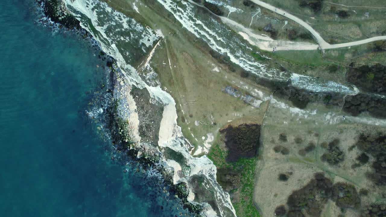 Aerial View of Coastline with Cliffs and Sea
