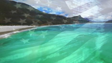 Digitale-Komposition-Der-Schwenkenden-US-Flagge-Vor-Der-Luftaufnahme-Des-Strandes-Und-Des-Meeres