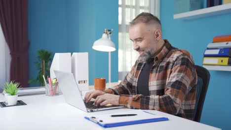 pleasant and peaceful businessman working positively.