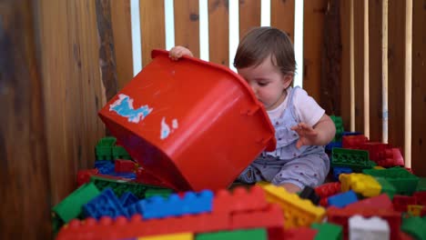 baby playing with toy blocks