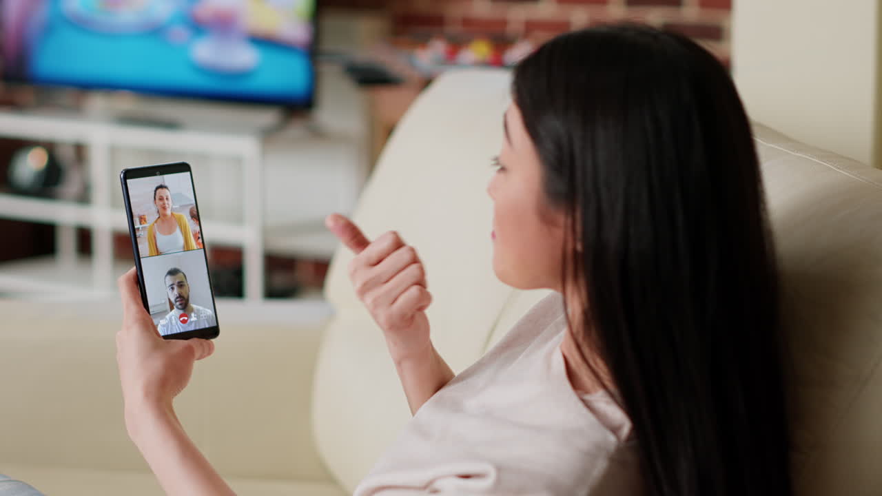 Woman on video call using smartphone