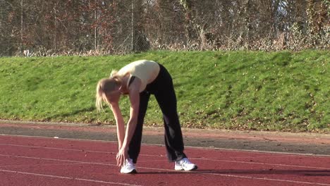 woman running on a track