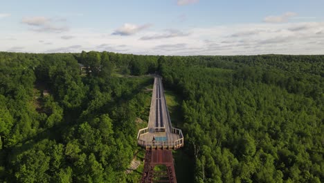 antique wooden train tracks at kinzua bridge state park in pennsylvania in the allegheny national forest drone front of bridge shot