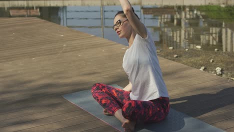 Female-yogi-practicing-at-sunrise