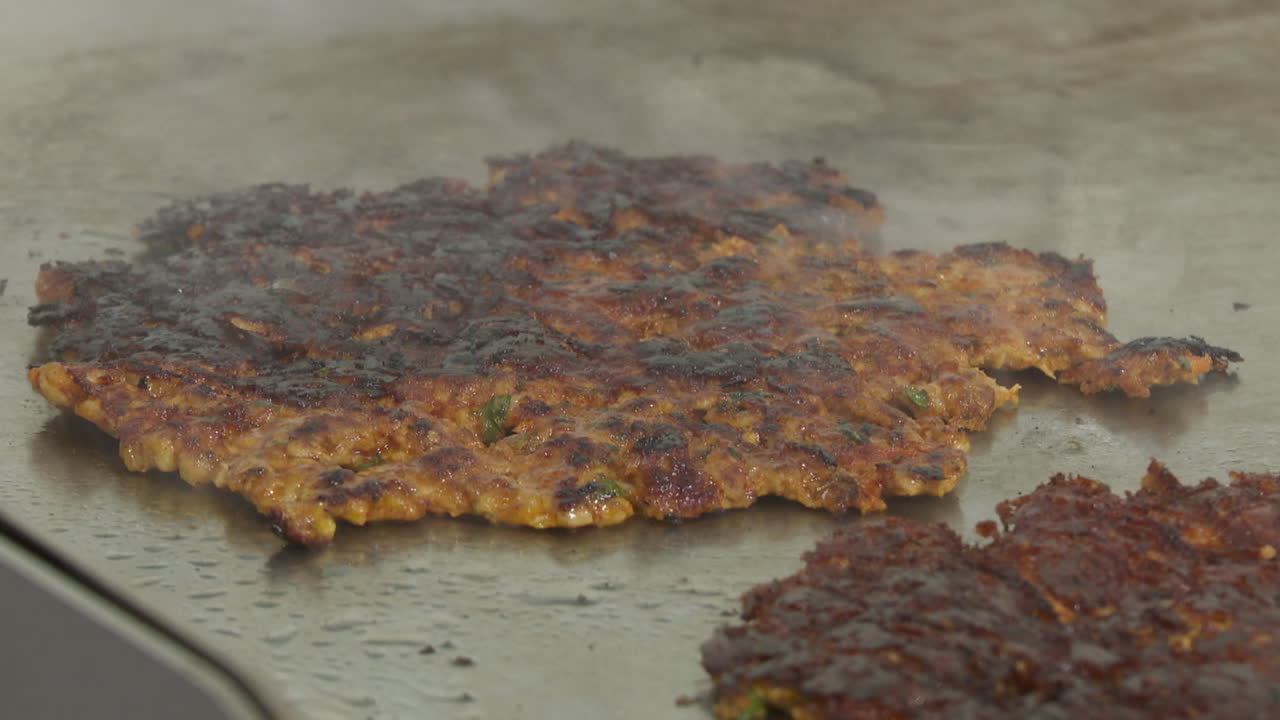 Food being cooked on a hot plate