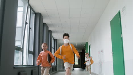 pupils running in the corridor.