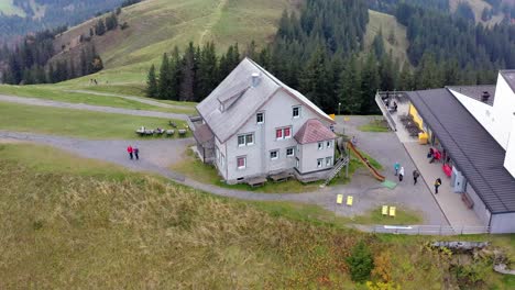 old restaurant lodge on the top side of the mountain kronberg in appenzell switzerland