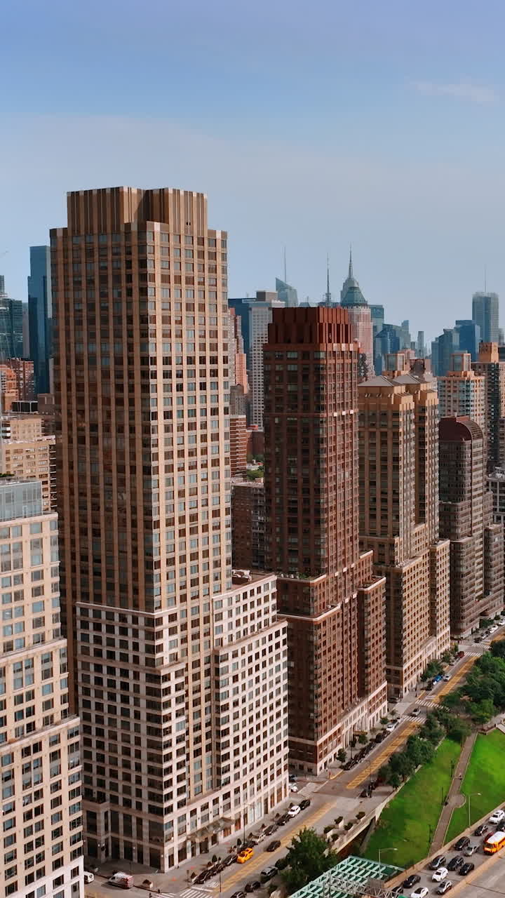 New York city buildifing on aerial view. Flying backwards above nyc city.