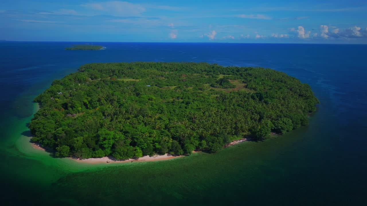 Yuo Island remote pristine beach untouched tropical Mushi island coastline village Wewak Madang Cape Wom Papua New Guinea aerial drone PNG dry season summer morning blue sky circle left up pan
