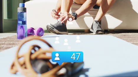 animación de personas icono con números sobre afroamericano atleta masculino atando cordones de zapatos