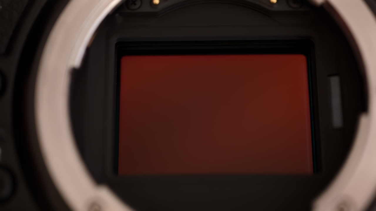 Close up view of a digital camera shutter opening