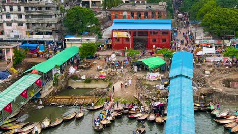 Buriganga-River-Port-Terminal-With-Wooden-Ferries-In-Sadarghat,-Dhaka,-Bangladesh