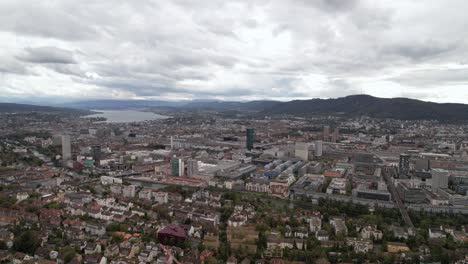 Aerial-dolly-over-beautiful-city-Zurich-with-the-famous-Prime-Tower-in-center