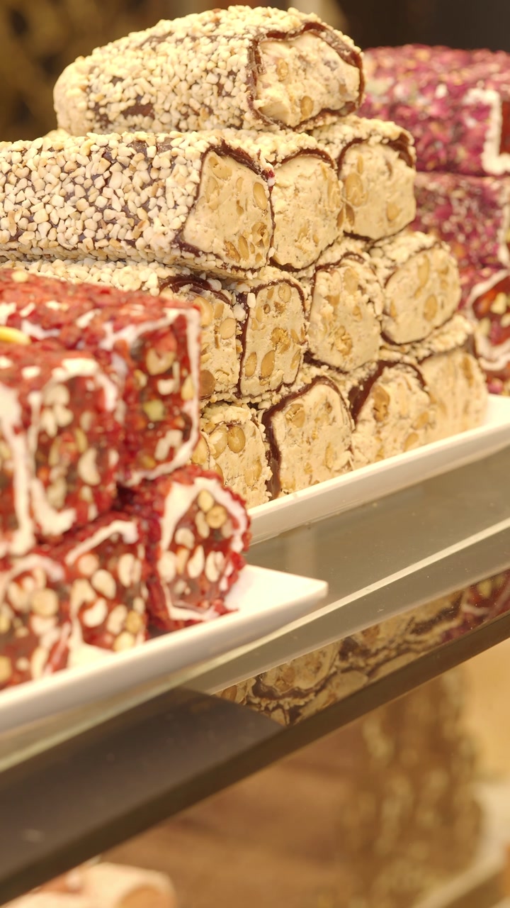 Close-up of Colorful Traditional Turkish Delight with Nuts and Rose Petals