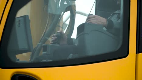 excavator operator at the controls