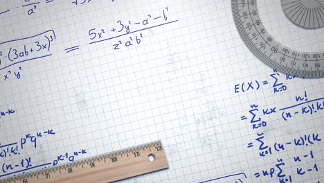 closeup mathematical formula and elements on paper school background 2