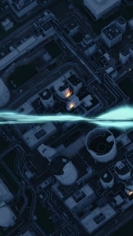 aerial view of a futuristic industrial complex at night