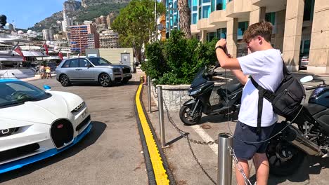 supercar driving near yachts in monte carlo