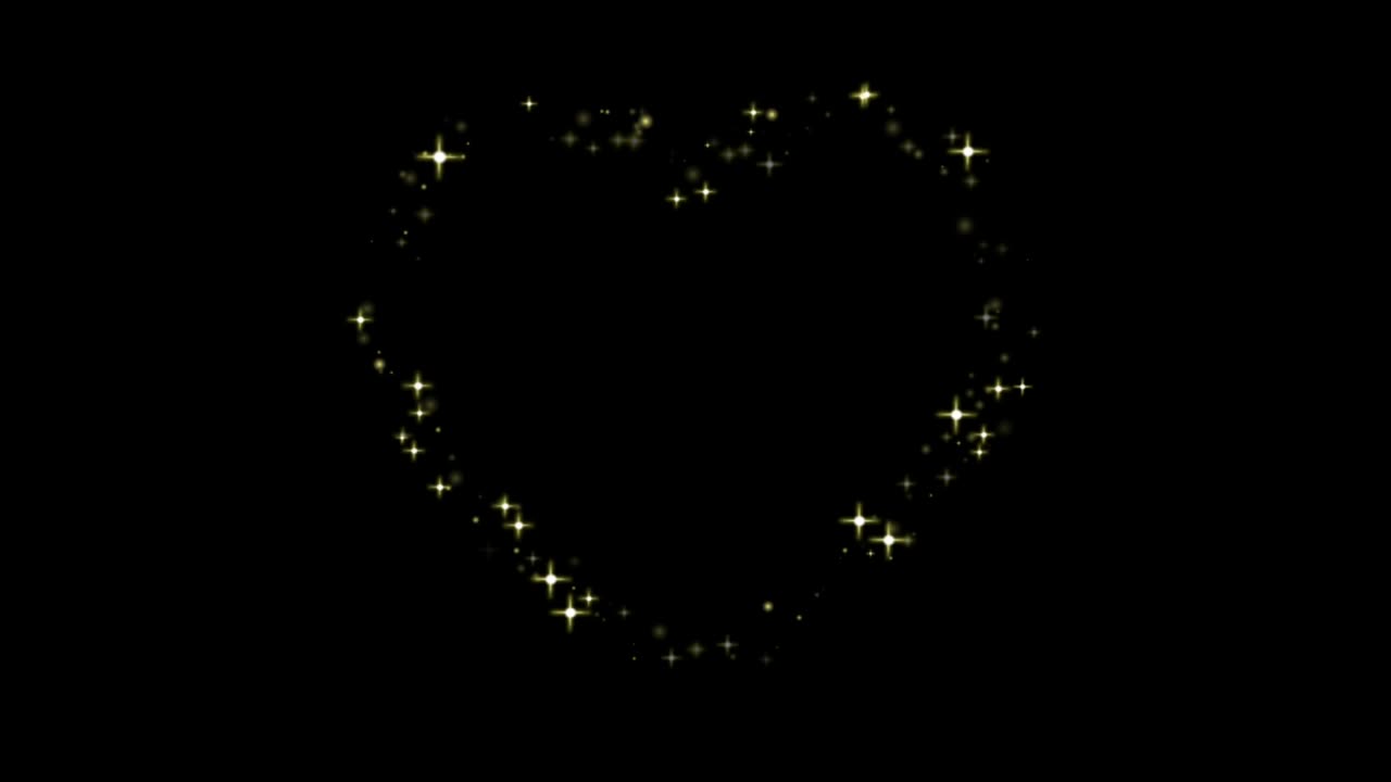 애니메이션 오렌지색 빛은 검은 바탕에 심장 모양을 반인다.