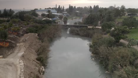 aerial view over kibbutz nir david with asi river channel