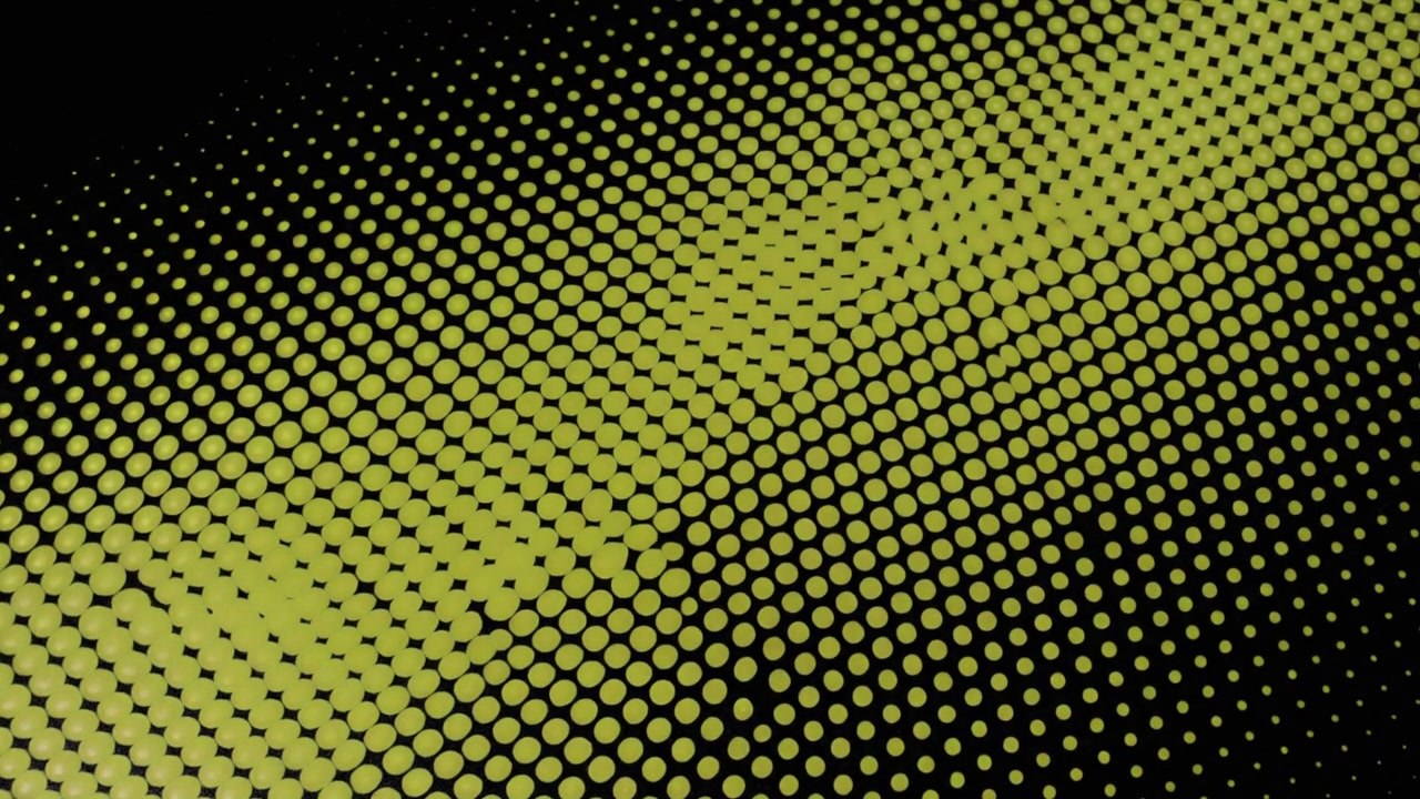 Abstrakt bevægelsesgrafik af gule prikker på sort baggrund