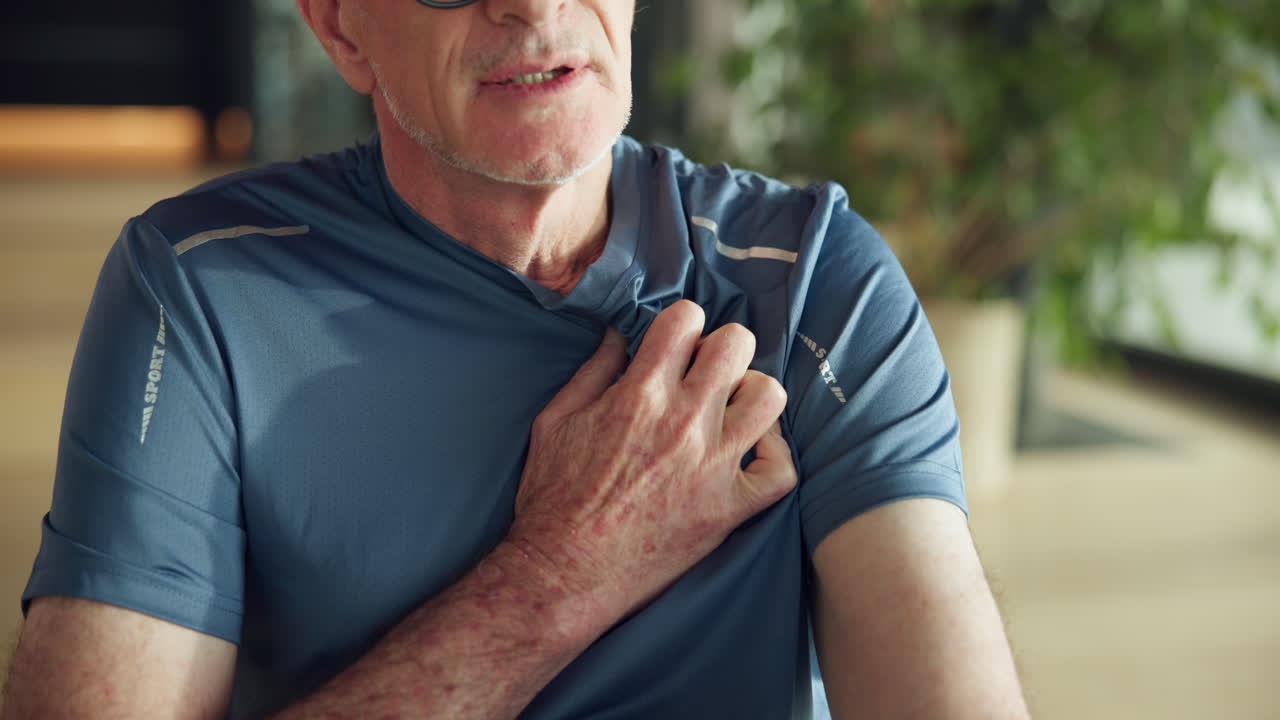 Senior Man Experiencing Chest Pain and Discomfort