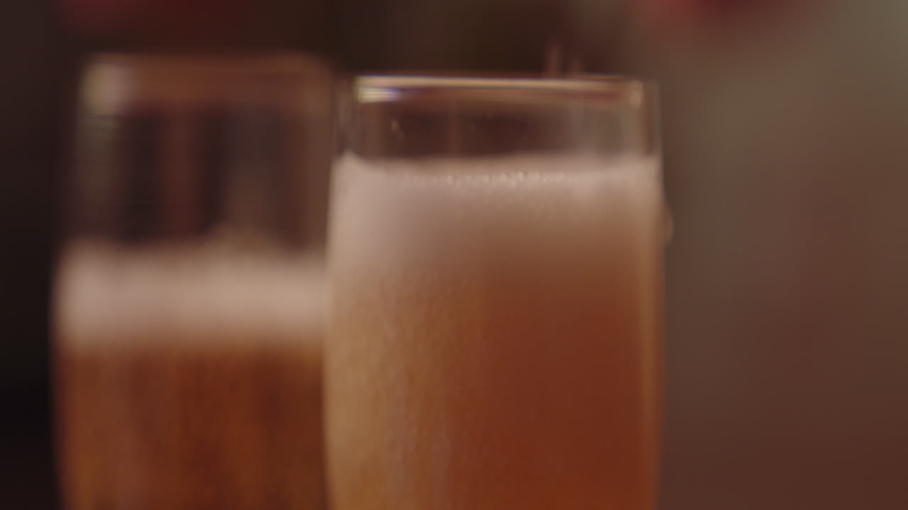 Champagne Pouring into Glasses