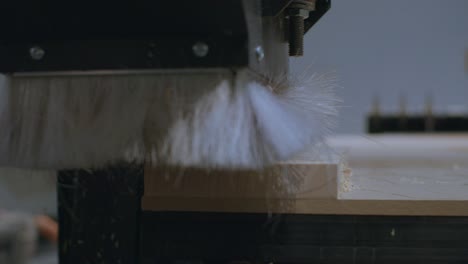 cnc machining a wooden block and returns to initial position