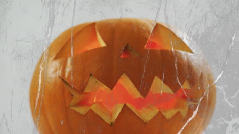 animación de calabaza tallada de halloween sobre un fondo gris