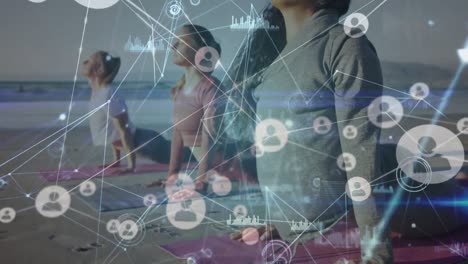 Animation-of-network-of-connections-over-diverse-women-practicing-yoga-on-beach