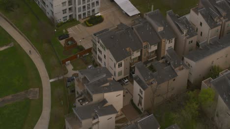 drone shot that reveals downtown houston, texas from heights community neighborhood