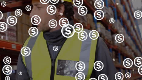 animation of multiple dollar symbols over caucasian male worker walking in warehouse