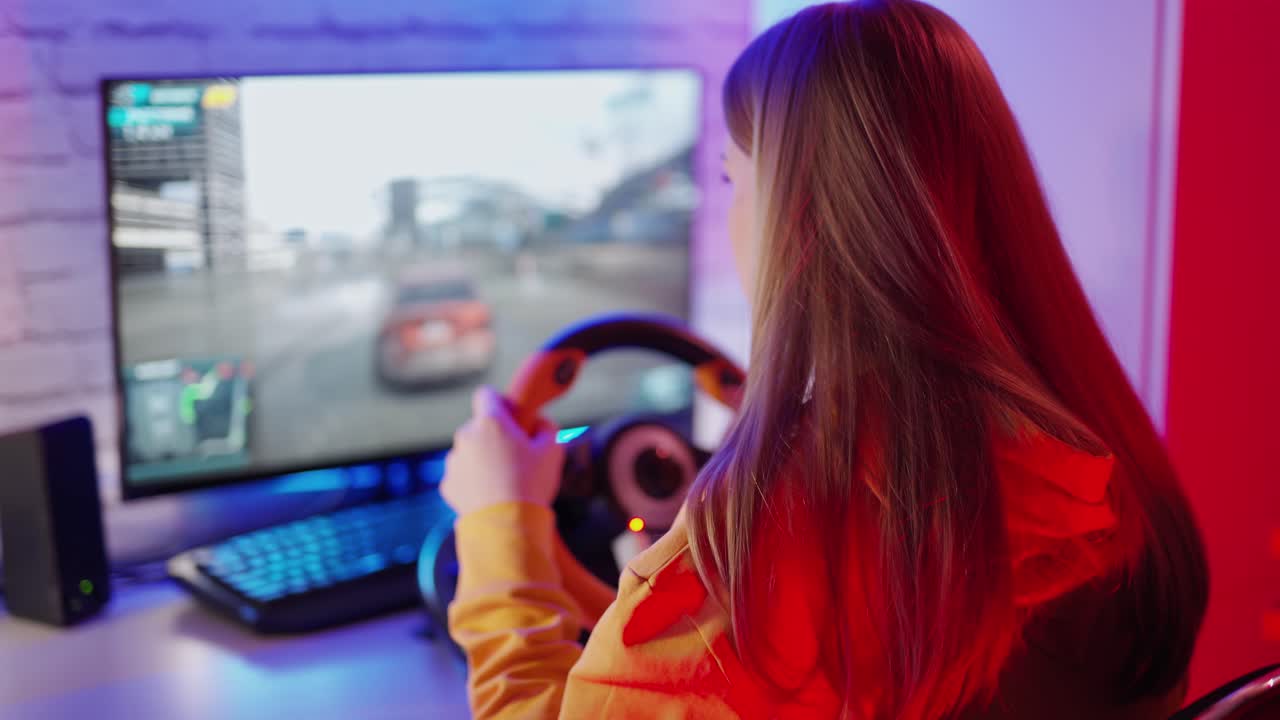 Girl playing car racing. Woman play the video game with virtual reality device