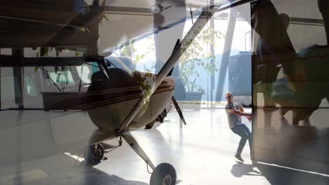 animation of plain in the air hangar over airport terminal