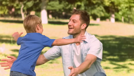 Man-in-slow-motion-catching-his-son