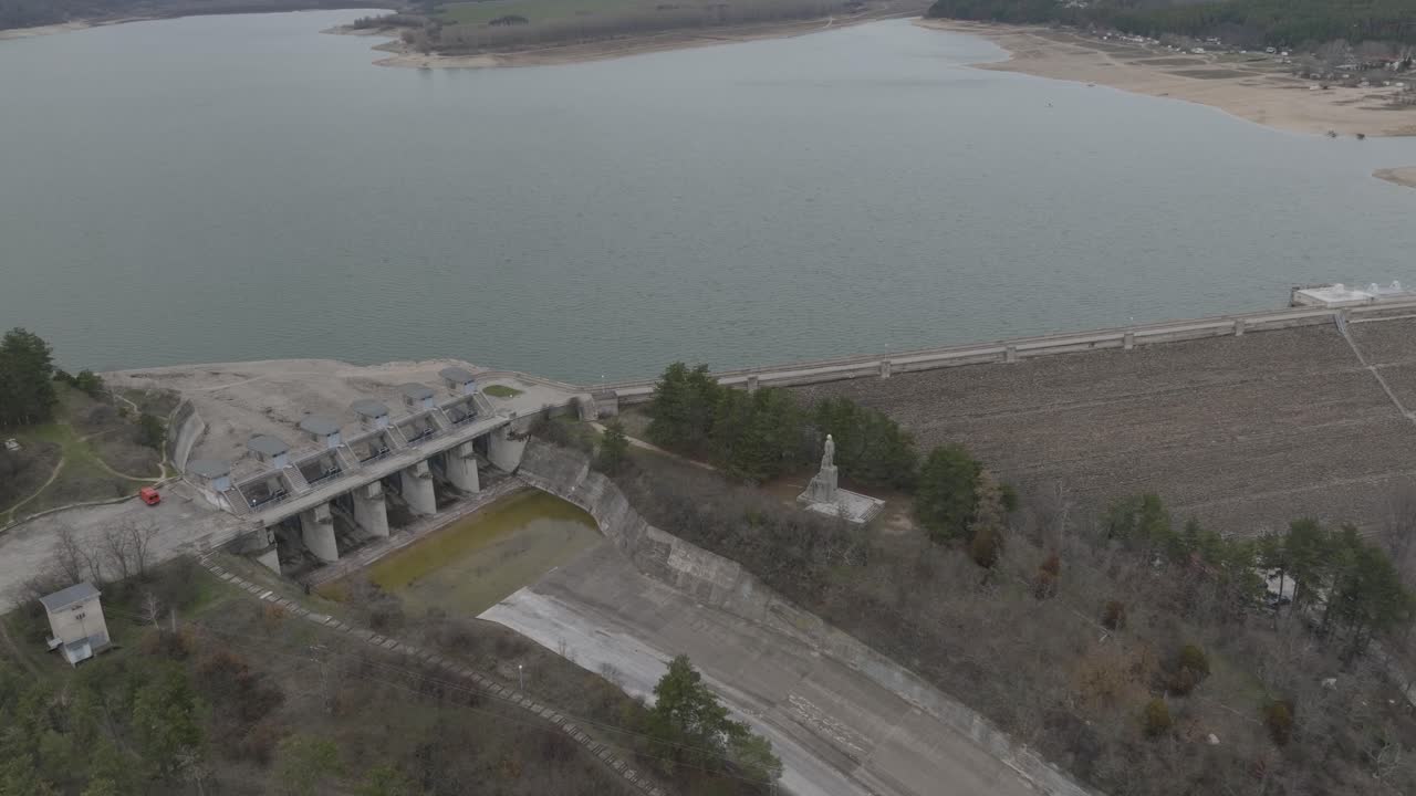Drone shot of a dam and part of a river