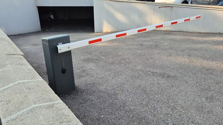 Red white gate barrier for underground car parking
