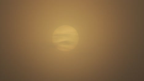 sunrise timelapse during cloudy foggy morning, sun behind clouds close up, maffra, gippsland, victoria, australia
