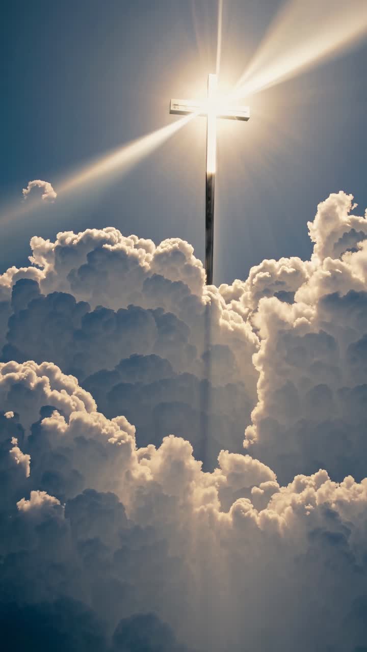 A divine video scene with a low-angle view of a glowing cross above fluffy clouds