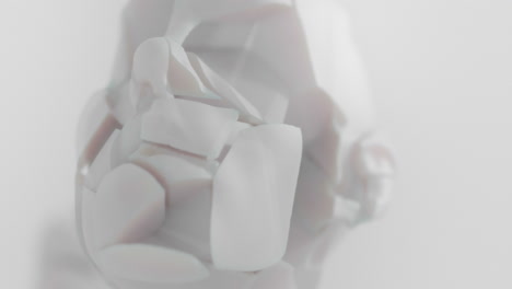 three crushed android heads on spikes in white space