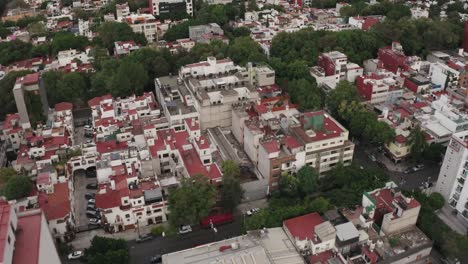 high angle view of mexico city rooftops, aerial drone fly over
