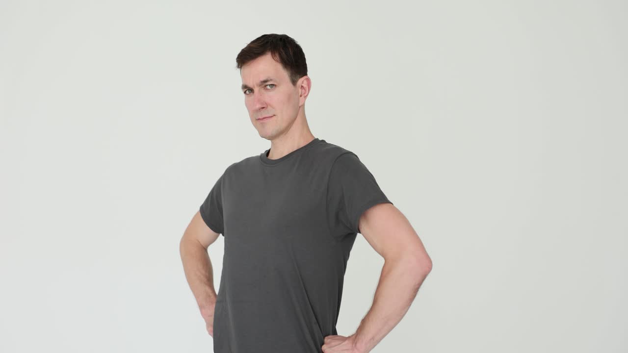 Man Posing or Experiencing Back Discomfort on White Background