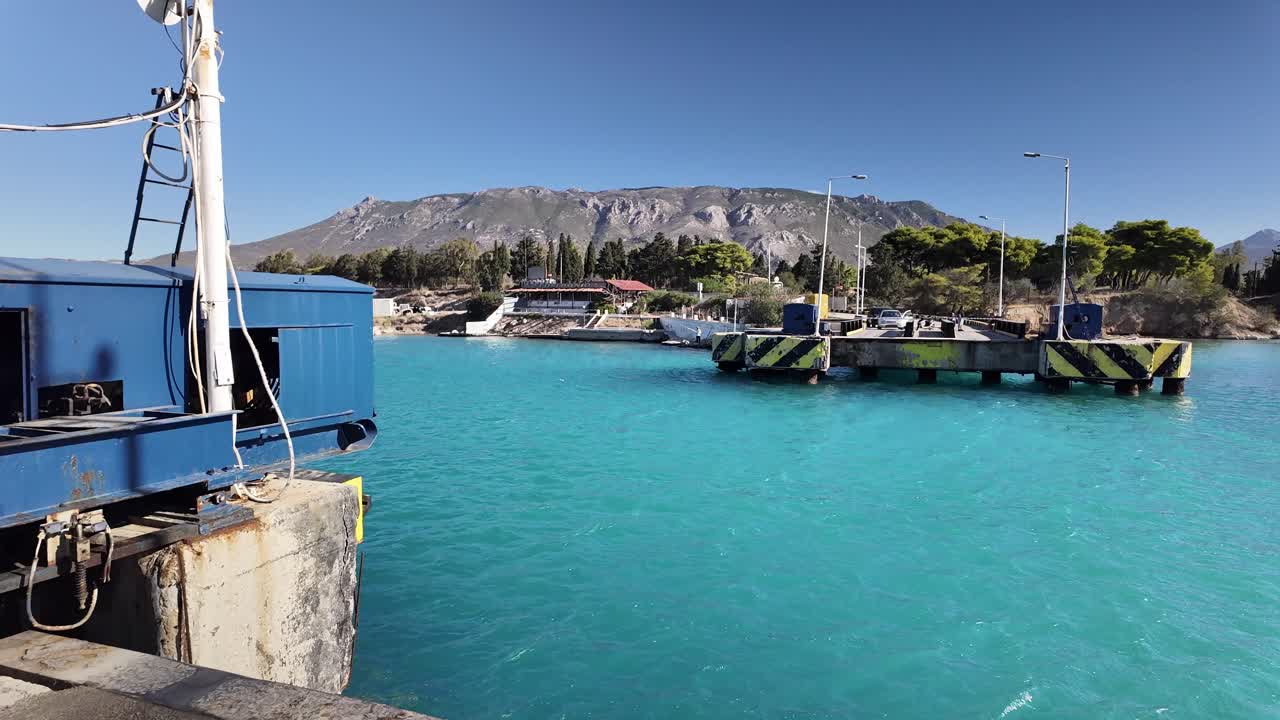 Traffic wait to cross Corinth canal submersible road bridge