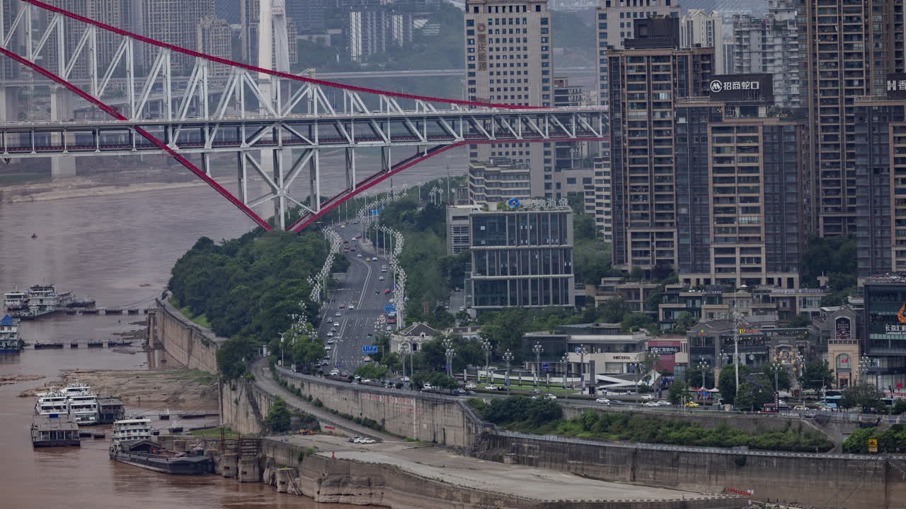 Timelapse of the amazing Chongqing cyberpunk city skyline from a high vantage point with the yangtze river