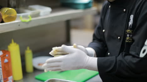 chef in restaurant kitchen cooking. chef cook in uniform at the restaurant kitchen