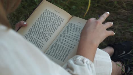 Girl-escapes-to-read-book-in-outdoor-peace-and-quiet-solitude-seclusion