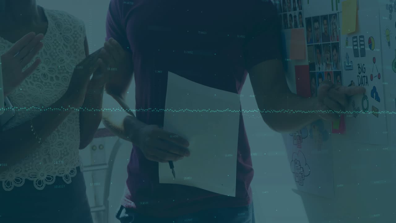 Man holding paper at office starting data waveform globe overlay, team clapping celebrating success