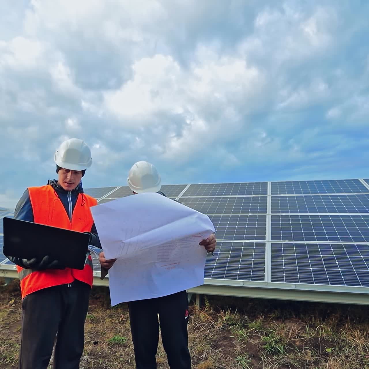 Engineers At Solar Power Station