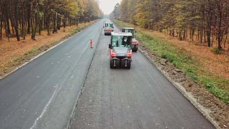 aerial view construction road place. construction of a new road in the forest area